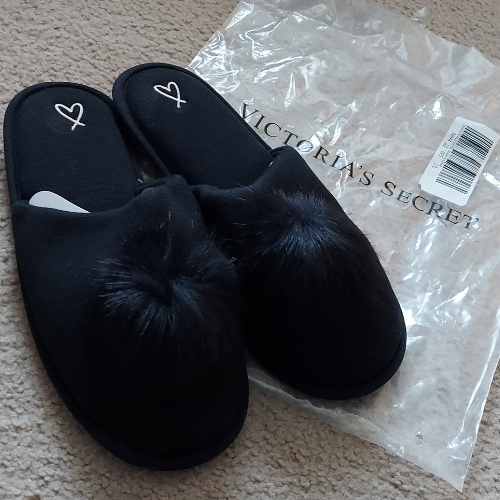 Black Victoria's Secret slippers with pom pom